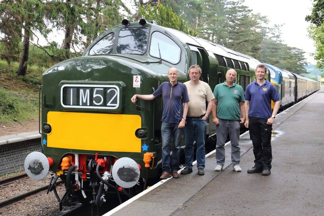 The four owners pose proudly in front of D6948 at Cheltenham Racecourse and reflect on the 5 year project following the successful first loaded test run from Toddington on Sunday 12th June.