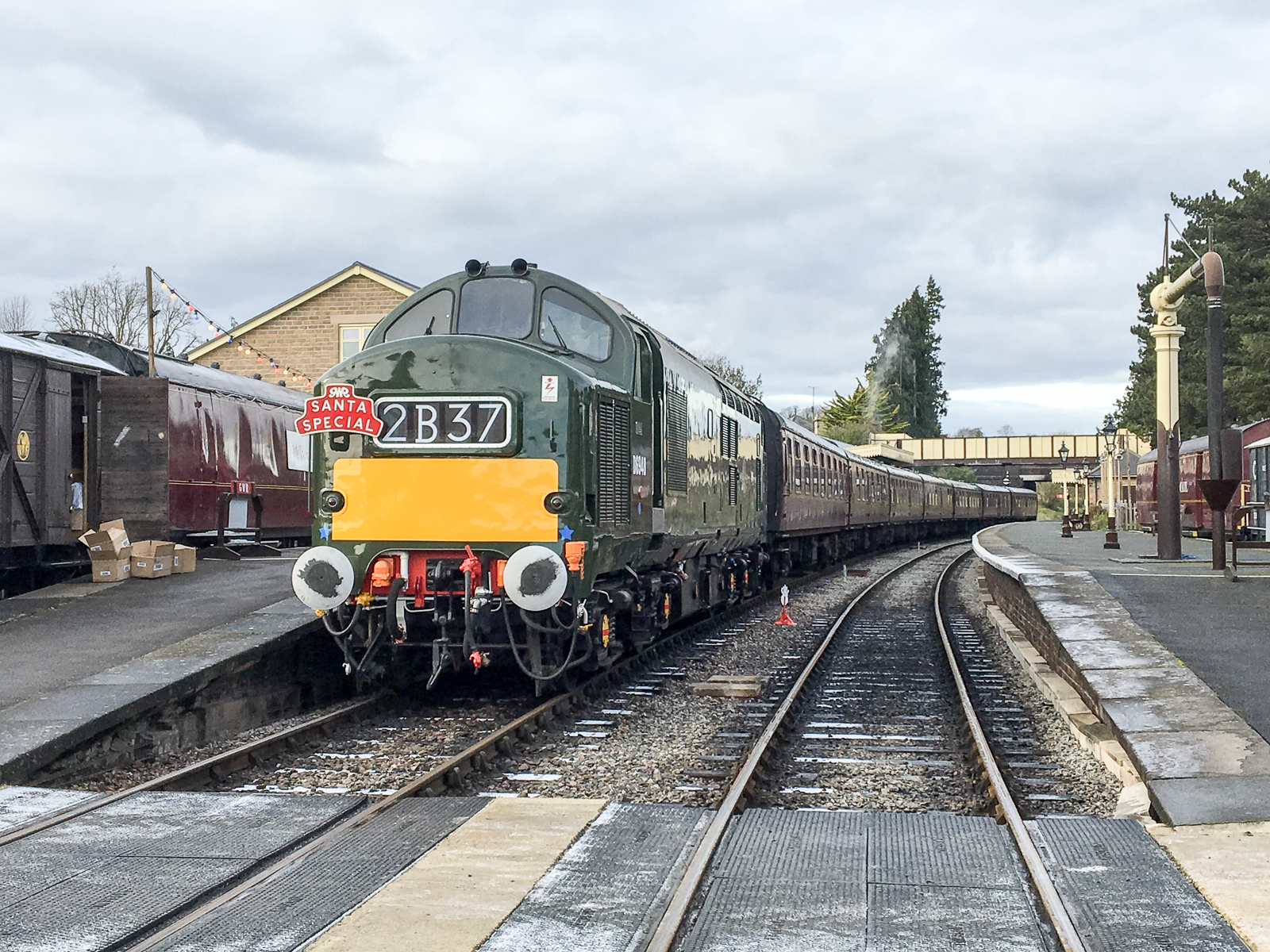 D6948 rests at Winchcombe having arrived with a Santa Special from Cheltenham Racecourse. A warm train and some happy children thanks to the steam heating boiler.